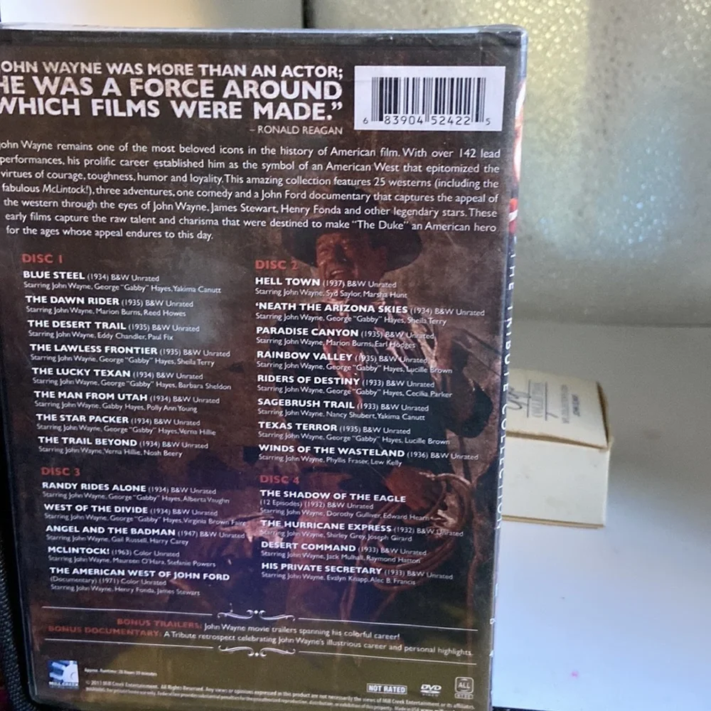 John Wayne dvd of 25 films + documentary sealed never opened